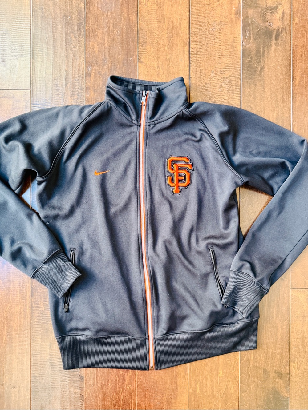 Nike Black Track Jacket with Orange Accents and Team Crest